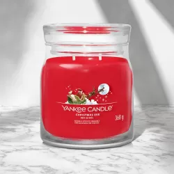 Ароматична свічка Christmas Eve Medium Yankee Candle